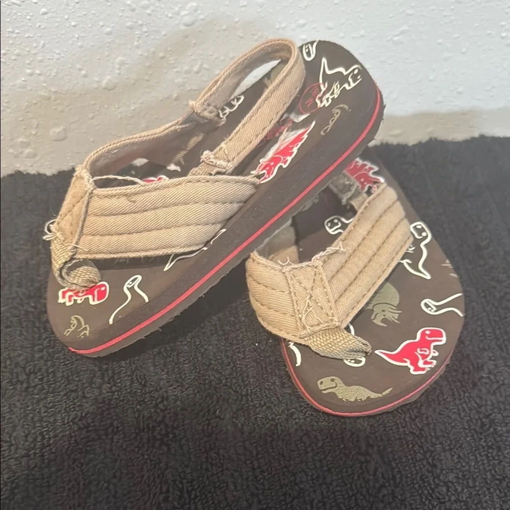 Cherokee Tan and Red Dinosaur Flip Flops